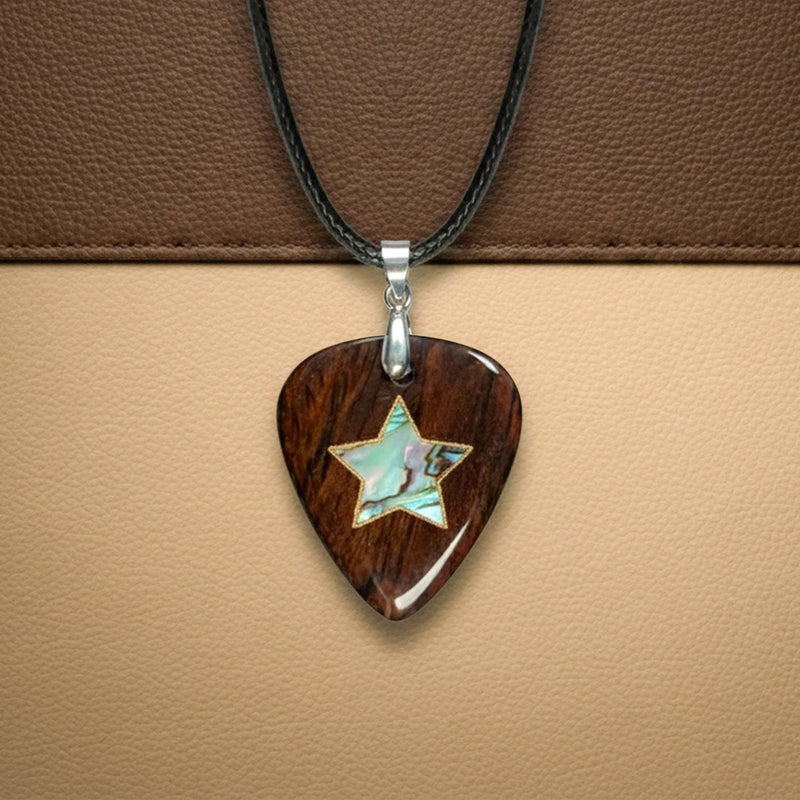 Wooden guitar pick necklace featuring a shimmering abalone shell star inlay.